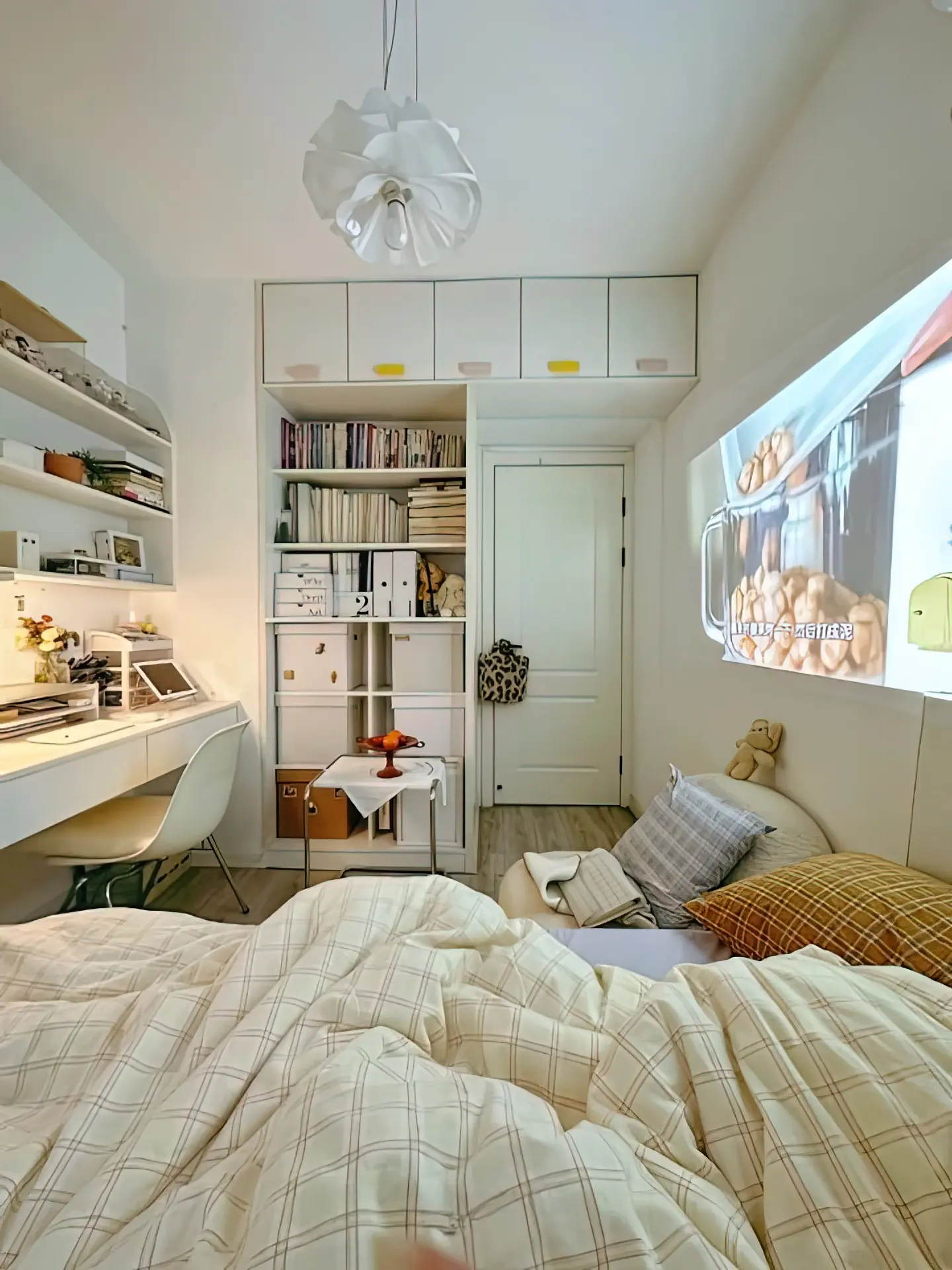 All-White Study Room with Built-In Projector Entertainment