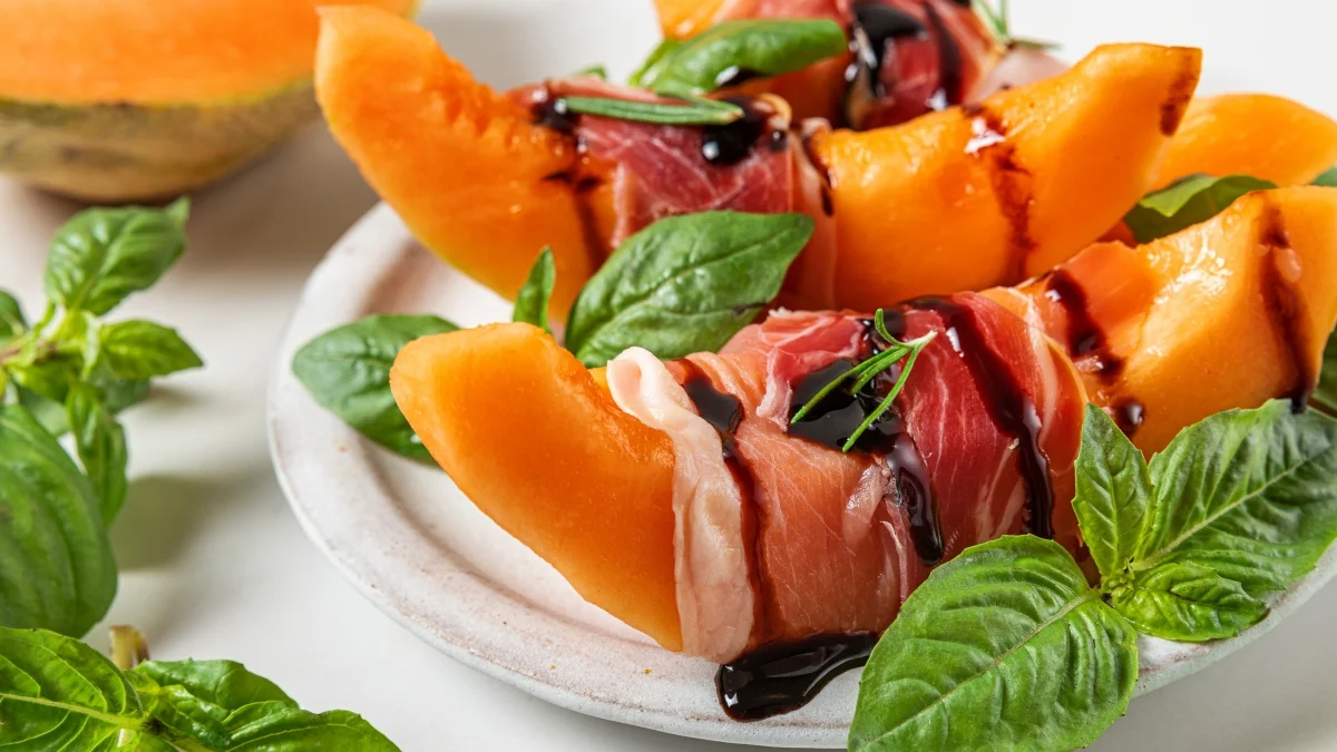 Prosciutto-wrapped melon with Balsamic Drizzle