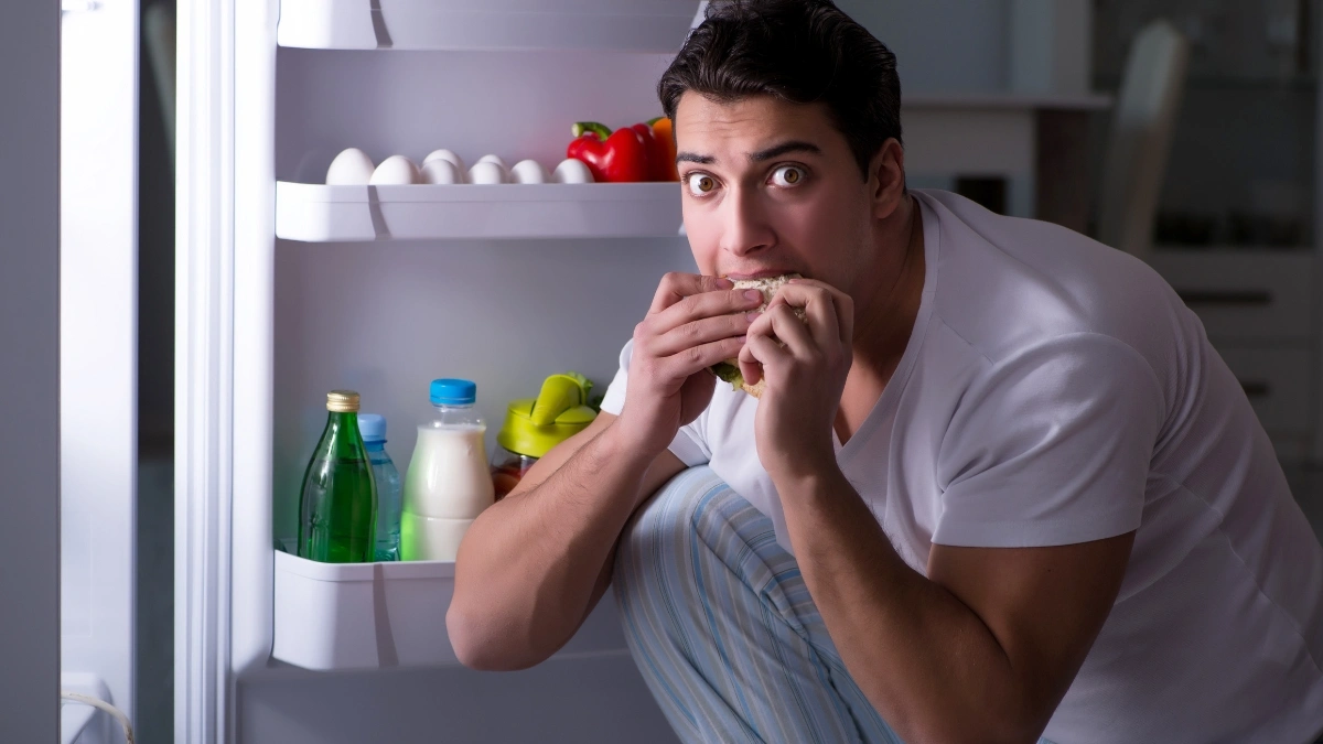 man eating food